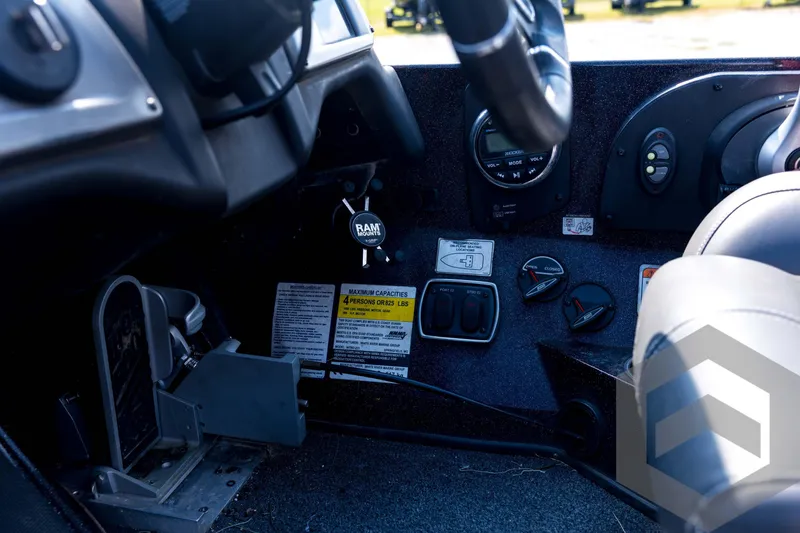Slide: The Image of 2020 Nitro Z21 boat dashboard with controls and steering wheel. - 57