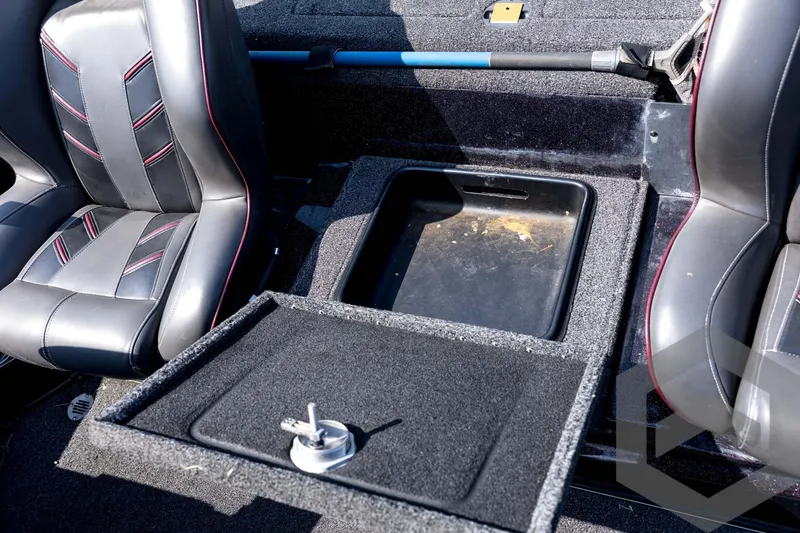 Slide: The Image of 2020 Nitro Z21 boat interior with storage compartment and leather seats. - 58