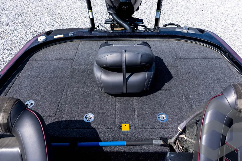 Slide: The Image of 2020 Nitro Z21 boat interior with cushioned seating and carpeted deck. - 60