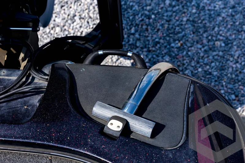 Slide: The Image of 2020 Nitro Z21 boat detail with metallic finish and handle on gravel background. - 67