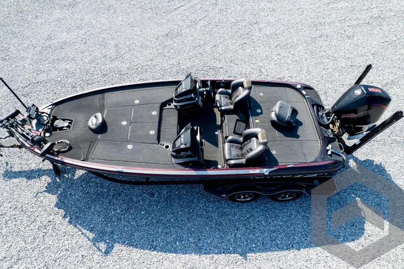 Slide: The Image of 2020 Nitro Z21 bass boat on gravel, featuring dual seats and powerful outboard motor. - 72