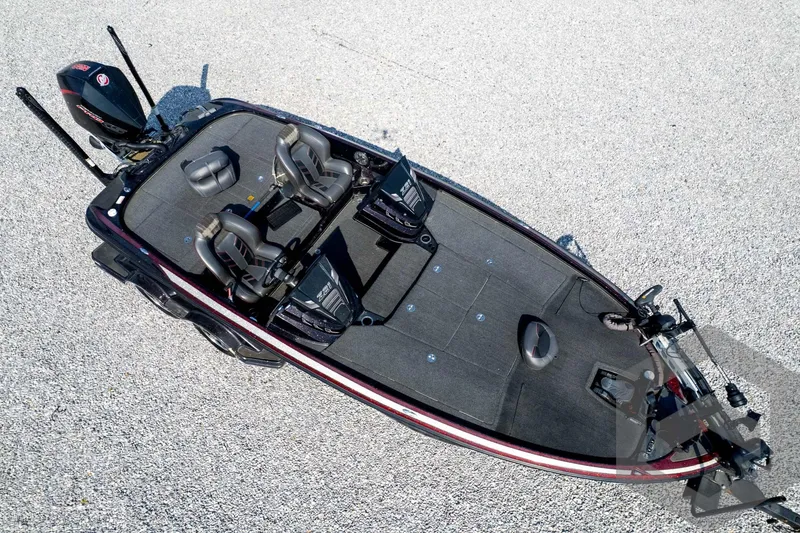 Slide: The Image of 2020 Nitro Z21 fishing boat with dual seats and advanced equipment on a gravel surface. - 75