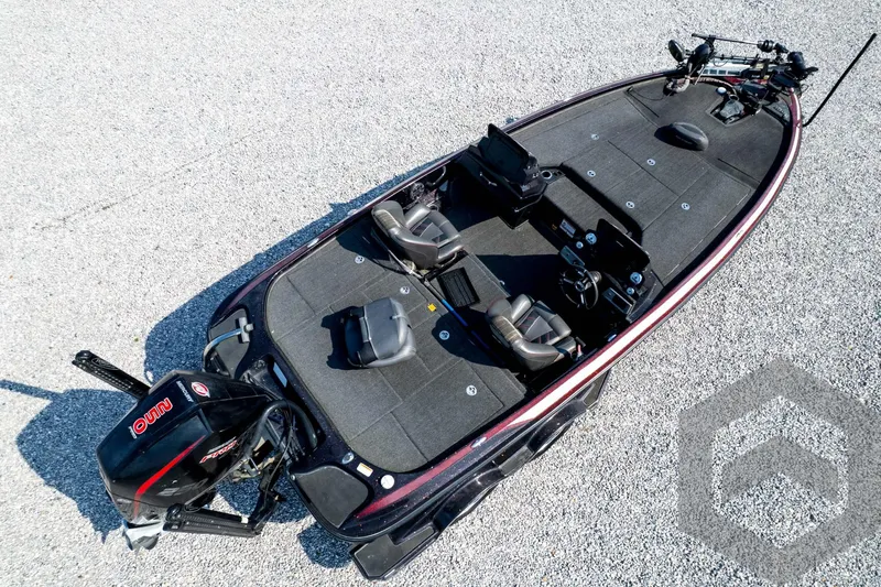 Slide: The Image of 2020 Nitro Z21 boat with dual seats and outboard motor on gravel surface. - 77