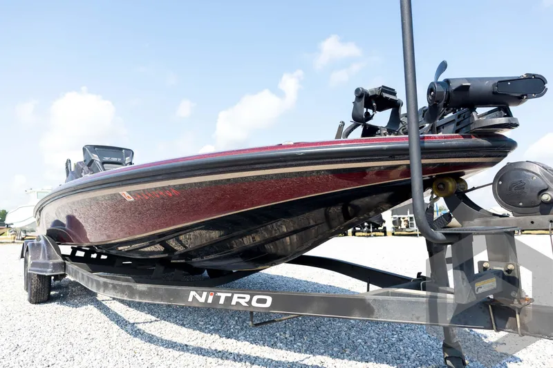 Slide: The Image of 2020 Nitro Z21 boat on trailer under clear blue sky. - 9