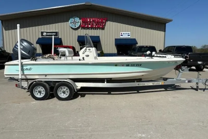 Slide: The Image of 2007 Scout 200 Bay Scout boat on trailer outside dealership. - 1