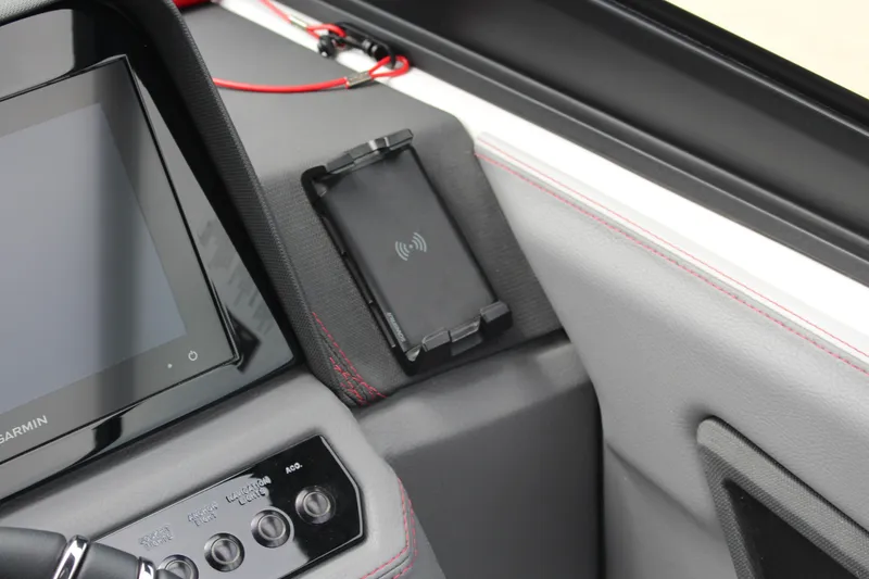 Slide: The Image of 2024 Cobalt R4 Surf dashboard with touchscreen and wireless charging pad. - 28