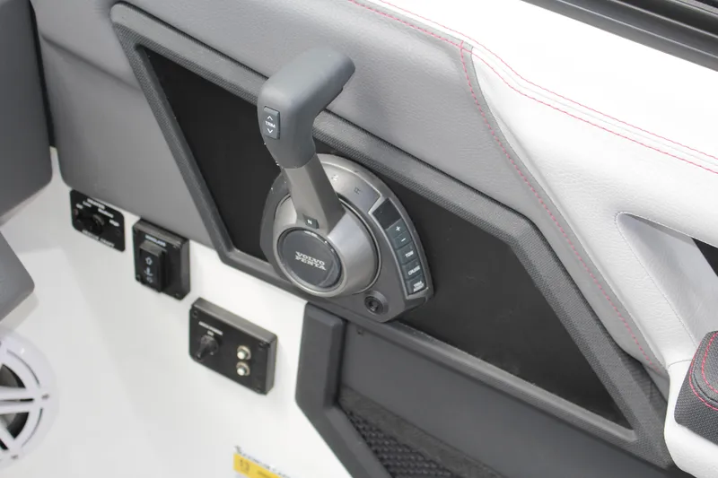 Slide: The Image of 2024 Cobalt R4 Surf boat control panel with Volvo Penta throttle lever. - 30