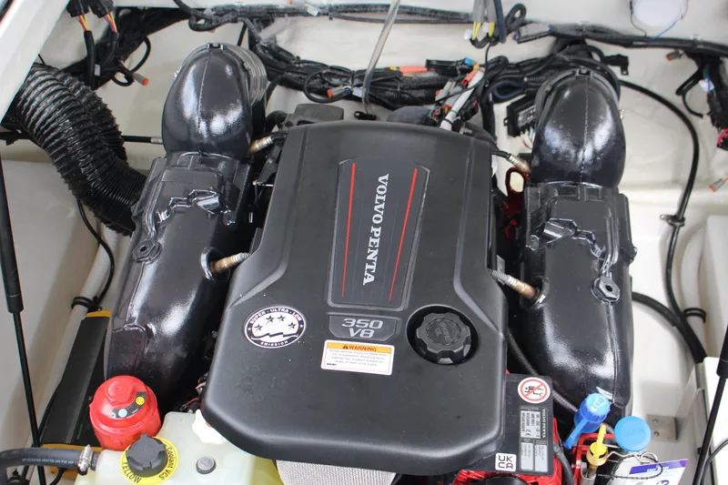 Slide: The Image of 2024 Cobalt R4 Surf engine compartment featuring a Volvo Penta 350 V8 engine. - 36