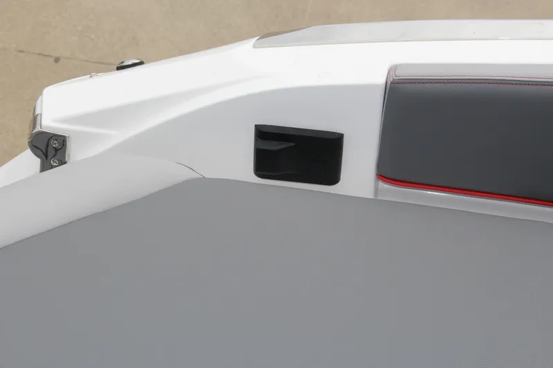 Slide: The Image of 2024 Cobalt R4 Surf boat interior detail with sleek upholstery and modern design. - 39