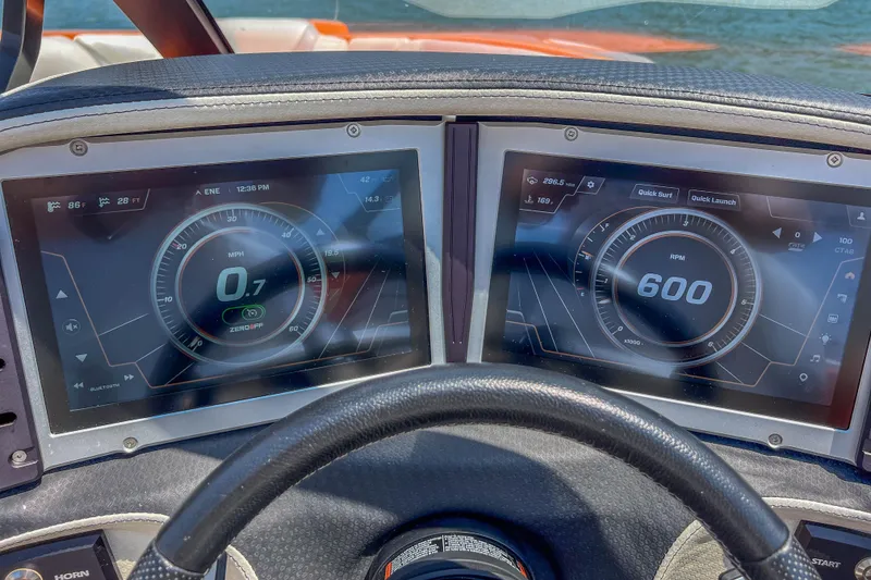 Slide: The Image of Dashboard of 2022 Centurion Ri245 boat with digital speedometer and RPM display. - 31