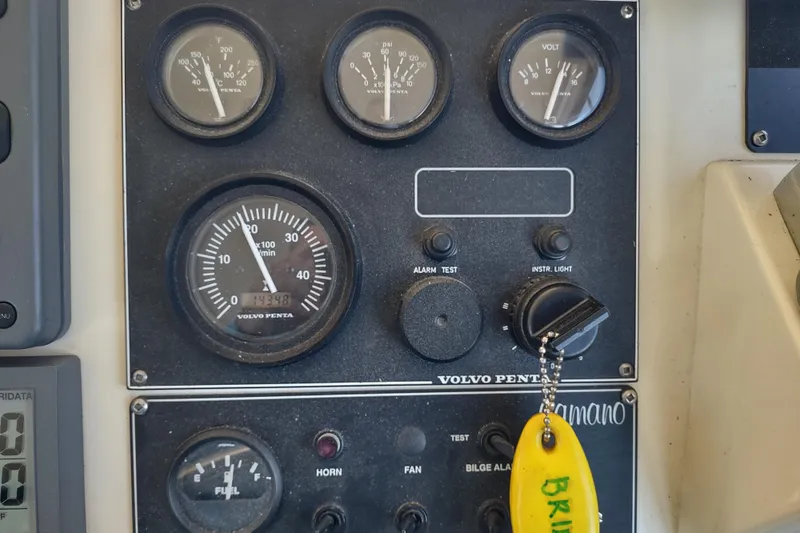 Slide: The Image of Control panel of a 2000 Camano Troll boat with Volvo Penta gauges. - 29