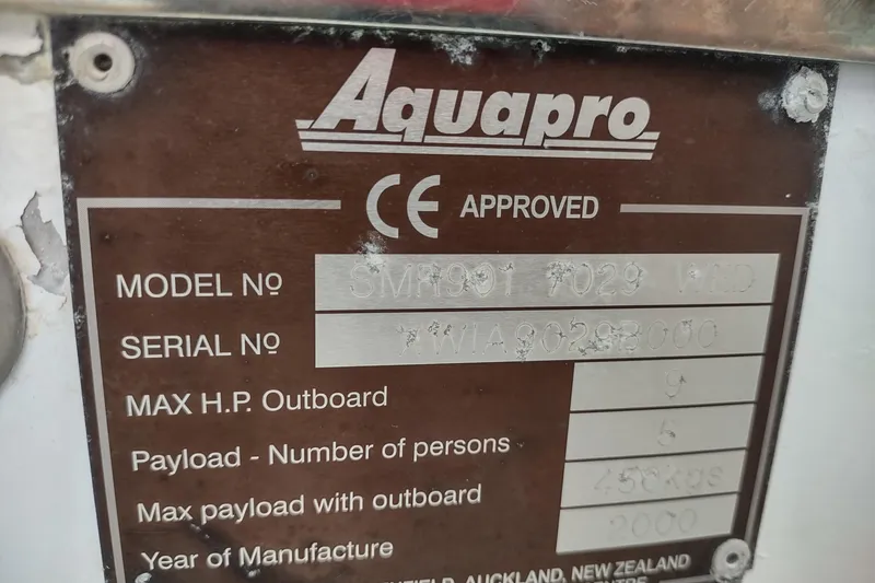 Slide: The Image of Boat identification plate displaying model, serial number, and specifications for a 2000 Camano Troll. - 51