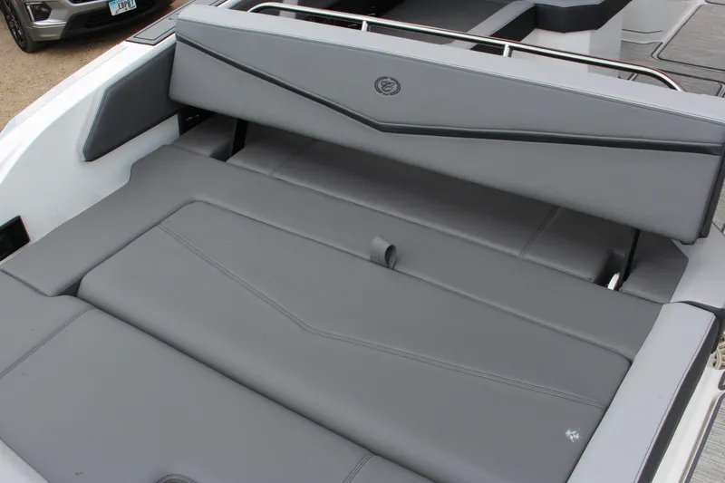 Slide: The Image of 2024 Cobalt R6 Surf boat with sleek gray seating and modern design. - 14