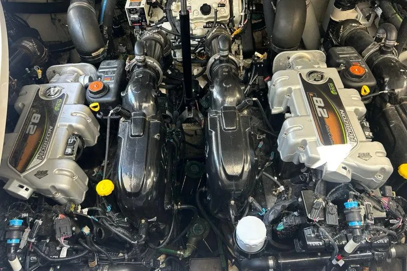 Slide: The Image of 2019 Sea Ray Sundancer 350 Coupe engine compartment with twin MerCruiser 8.2 Horizon engines. - 14