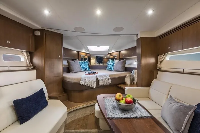 Slide: The Image of Manufacturer Provided Image: Luxurious interior of 2019 Sea Ray Sundancer 350 Coupe with cozy seating and elegant decor. - 31