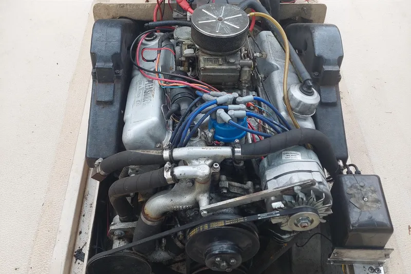 Slide: The Image of 1986 Shamrock 20 Walk Through engine with visible wiring and components. - 7