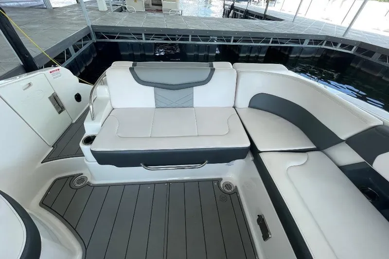 Slide: The Image of 2020 Chaparral 297 SSX boat interior with sink and seating area. - 12