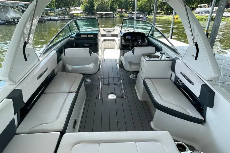 Slide: The Image of 2020 Chaparral 297 SSX boat interior with spacious seating and modern design. - 4