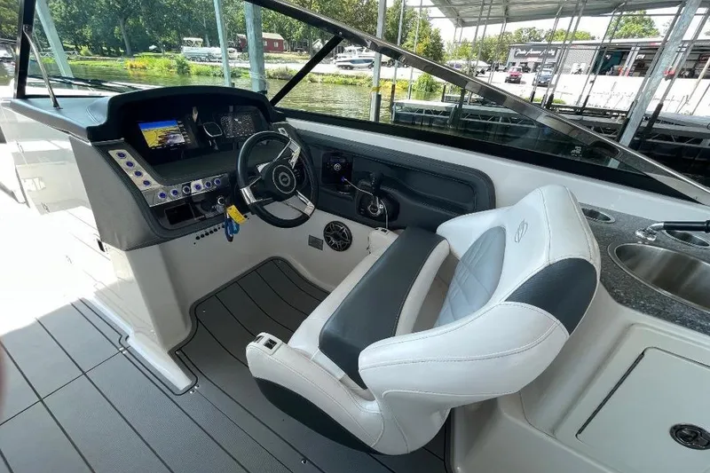 Slide: The Image of Interior of 2020 Chaparral 297 SSX boat with seating and sink. - 9
