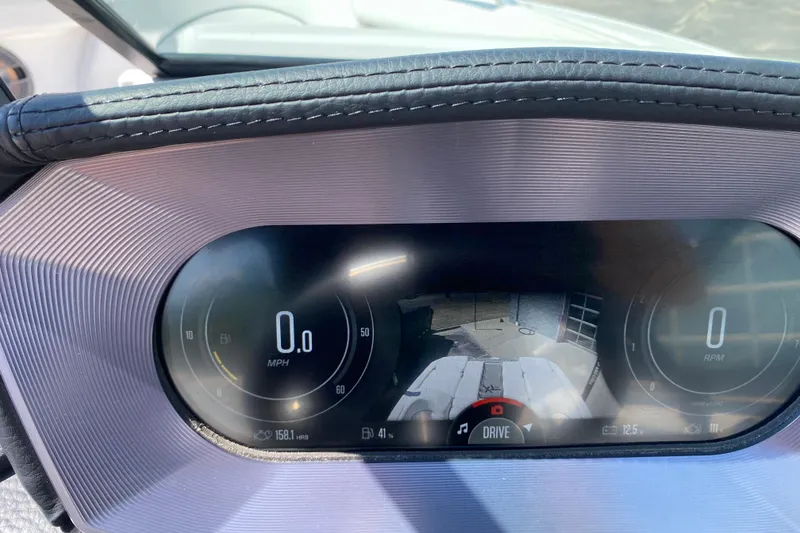 Slide: The Image of 2022 MasterCraft XT25 dashboard display showing speed and RPM gauges. - 26