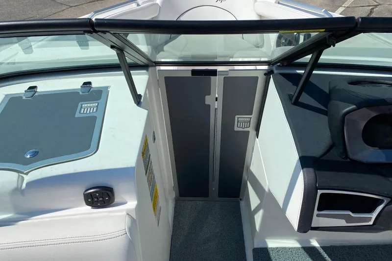 Slide: The Image of 2022 MasterCraft XT25 boat interior with sleek design and modern features. - 30