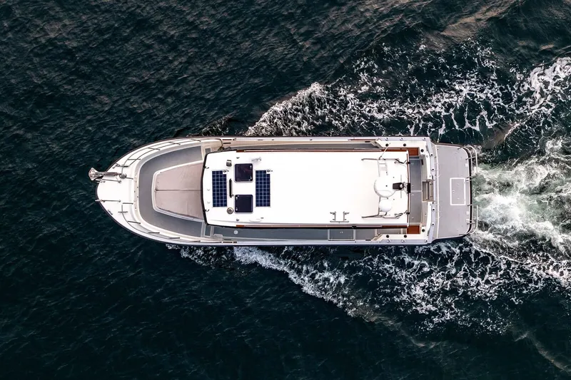 Slide: The Image of Aerial view of 2019 Targa 35 boat cruising on the ocean. - 8