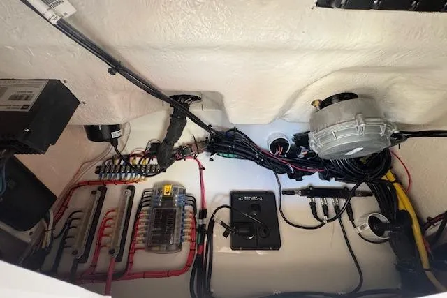 Slide: The Image of Electrical system inside 2025 Drakkar 280CC boat, featuring wiring and components. - 24
