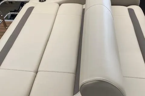 Slide: The Image of 2025 Bentley Pontoons Legacy 223 Swingback, luxurious cream seating detail. - 7