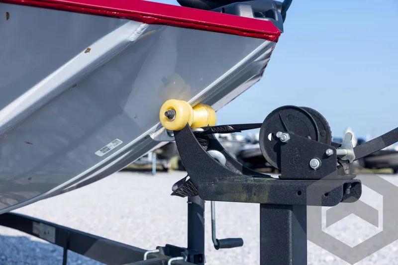 Slide: The Image of 2022 Tracker Pro 170 boat on trailer with winch and yellow roller. - 15