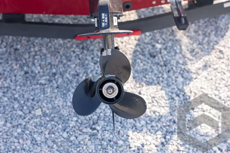 Slide: The Image of Propeller of 2022 Tracker Pro 170 boat on gravel surface. - 23