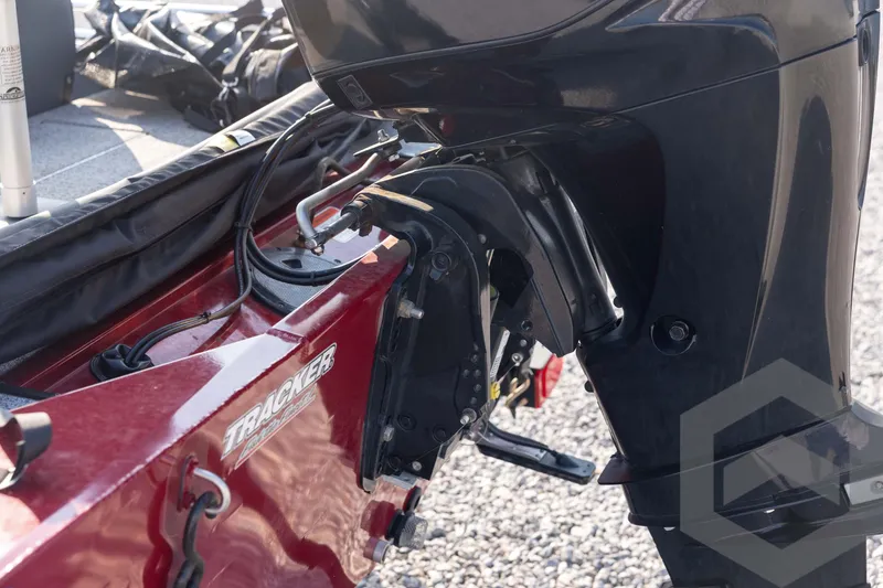 Slide: The Image of 2022 Tracker Pro 170 boat motor and transom detail in sunlight. - 28