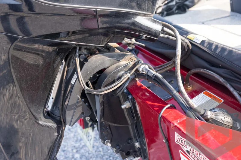 Slide: The Image of 2022 Tracker Pro 170 boat engine and wiring detail, showcasing mechanical components. - 29