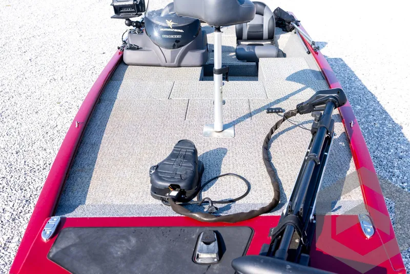 Slide: The Image of 2022 Tracker Pro 170 boat interior with fishing equipment and seating. - 34