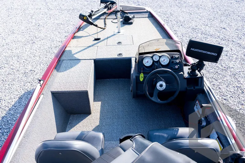 Slide: The Image of 2022 Tracker Pro 170 boat interior with steering console and Humminbird fish finder. - 35