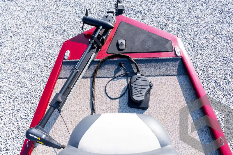 Slide: The Image of 2022 Tracker Pro 170 boat deck with trolling motor and foot pedal controls. - 40