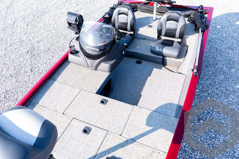 Slide: The Image of 2022 Tracker Pro 170 boat interior with dual seats and steering console. - 41