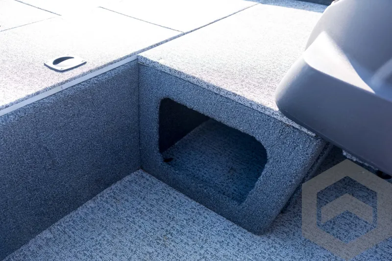 Slide: The Image of 2022 Tracker Pro 170 boat interior with storage compartment and textured flooring. - 45