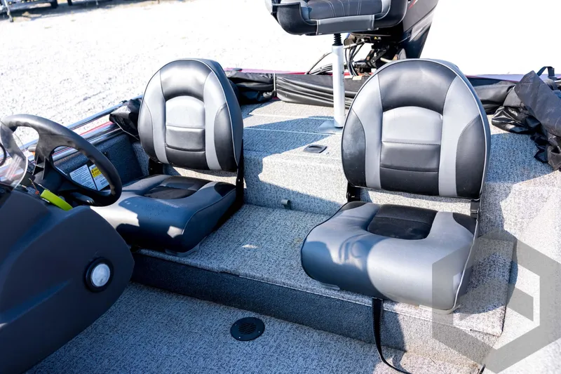 Slide: The Image of 2022 Tracker Pro 170 boat interior with black and gray seating. - 51