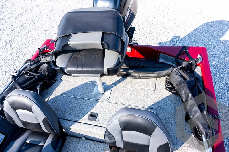 Slide: The Image of 2022 Tracker Pro 170 boat interior with seating and storage compartments. - 54