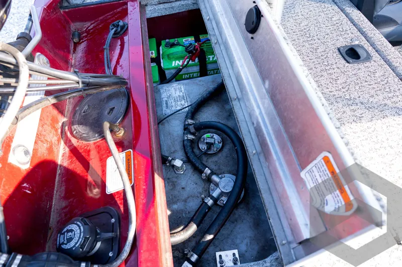 Slide: The Image of Interior view of 2022 Tracker Pro 170 boat showing battery and wiring components. - 57