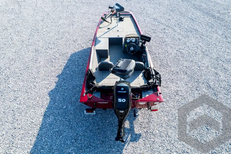 Slide: The Image of 2022 Tracker Pro 170 boat with Mercury 50 engine, aerial view on gravel surface. - 59