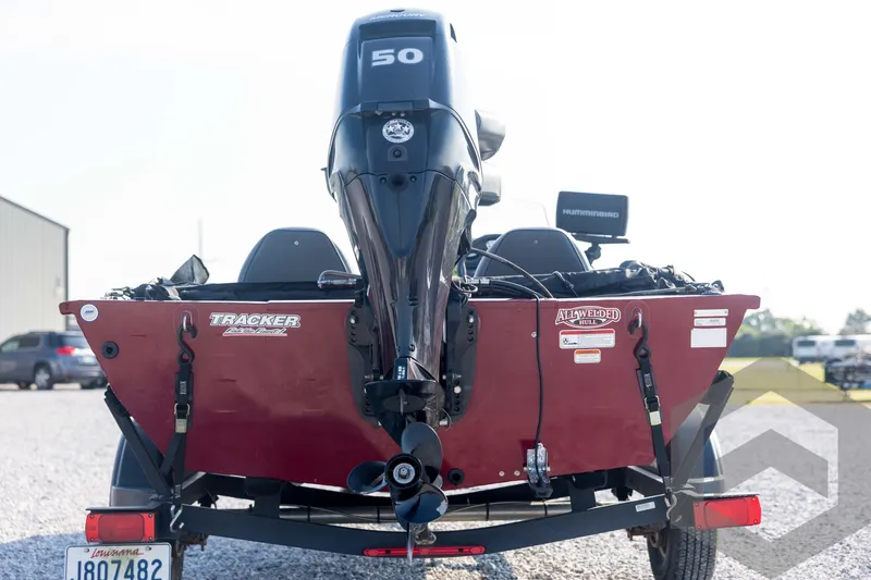 Slide: The Image of 2022 Tracker Pro 170 boat with 50 HP engine, rear view on trailer. - 6