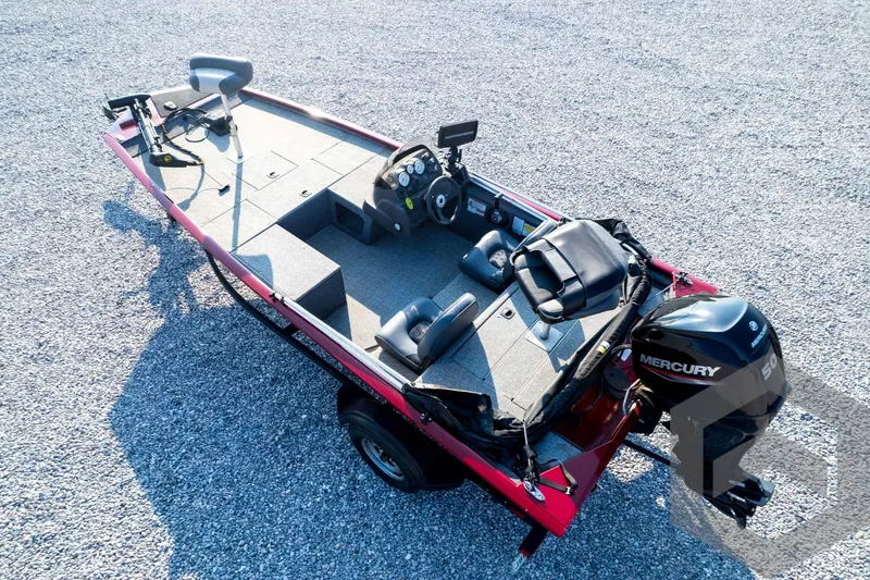 Slide: The Image of 2022 Tracker Pro 170 boat with Mercury engine on gravel surface. - 60