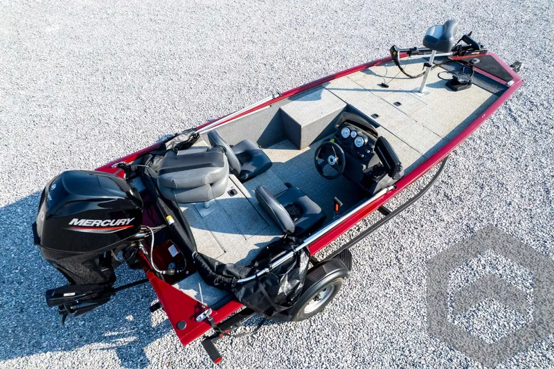Slide: The Image of 2022 Tracker Pro 170 boat with Mercury engine on gravel surface, aerial view. - 66