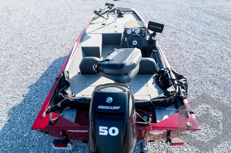 Slide: The Image of 2022 Tracker Pro 170 boat with Mercury 50 engine, parked on gravel. - 67