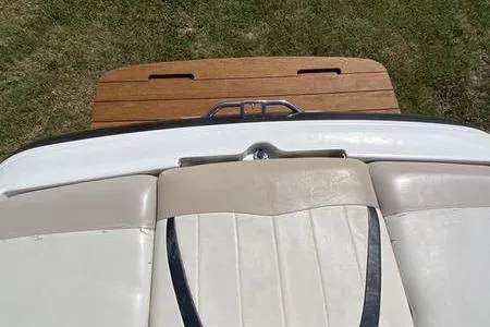 Slide: The Image of 2001 MasterCraft MariStar 230 VRS boat interior with teak swim platform. - 7