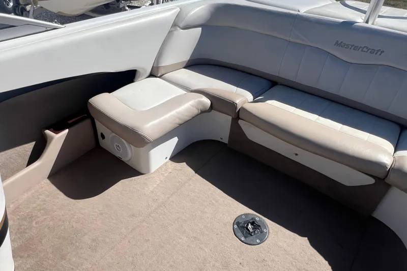 Slide: The Image of Interior of 2001 MasterCraft MariStar 230 VRS boat with beige seating. - 9