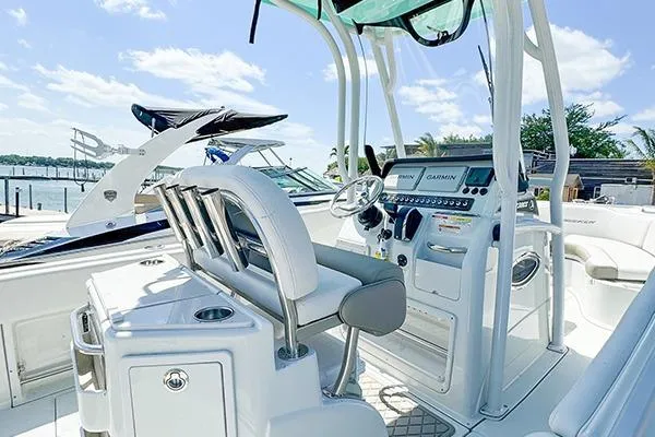 Slide: The Image of 2025 Crownline Finseeker 230CC boat interior with modern helm and seating. - 3