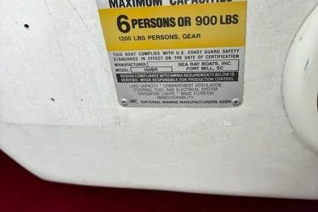 Slide: The Image of Capacity label on 1989 Sea Ray 160 Bow Rider, max 6 persons or 900 lbs. - 5