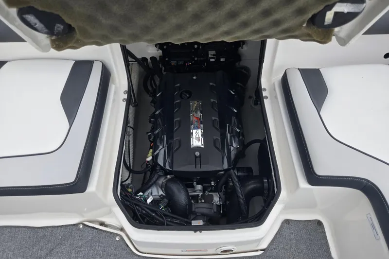 Slide: The Image of 2019 Yamaha Boats AR195 engine compartment with sleek design and efficient layout. - 23